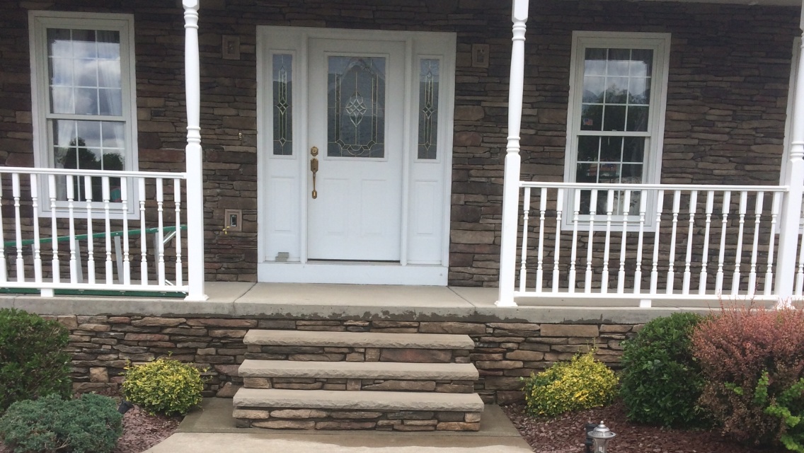 Beautifully crafted stone retaining wall showcasing expert masonry techniques