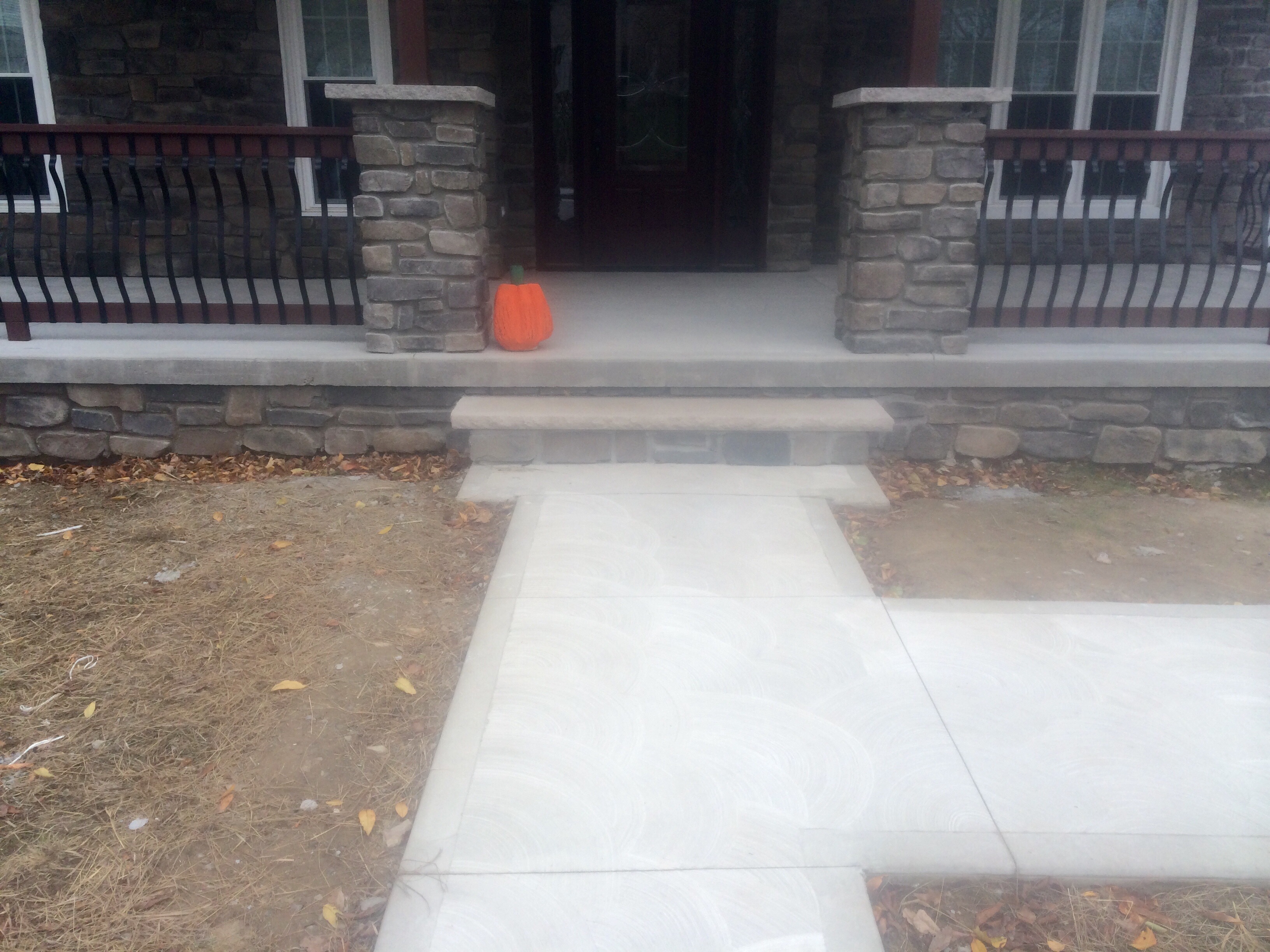 Interior stone accent wall installation in remodeled living space
