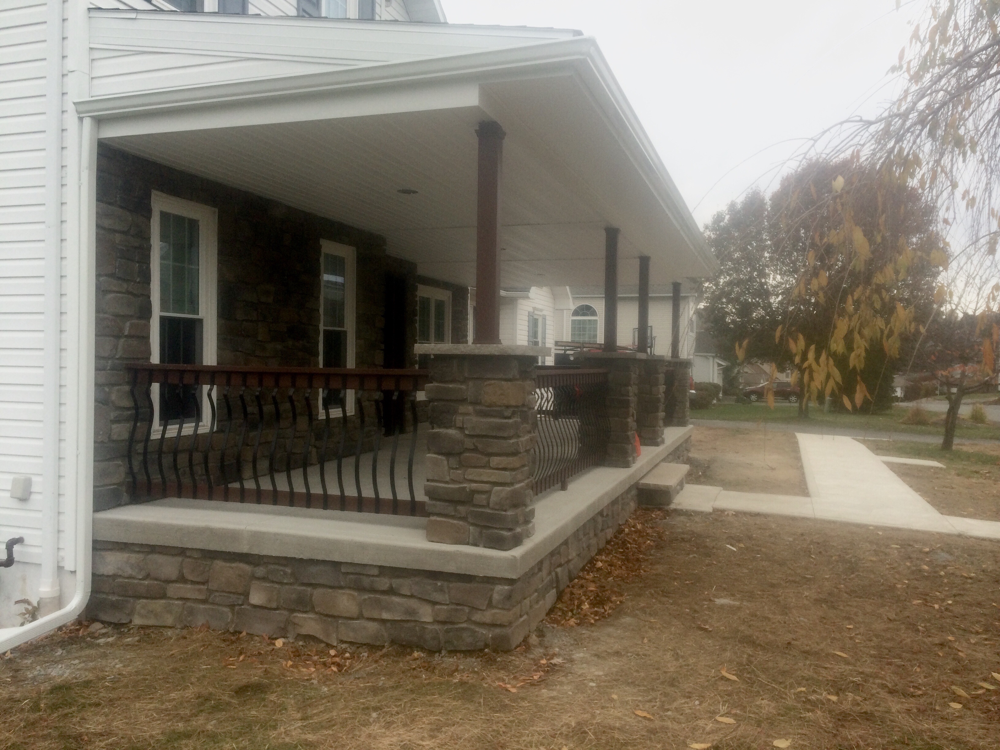 Expertly crafted stone masonry wall showcasing Bob Brislin's precision craftsmanship