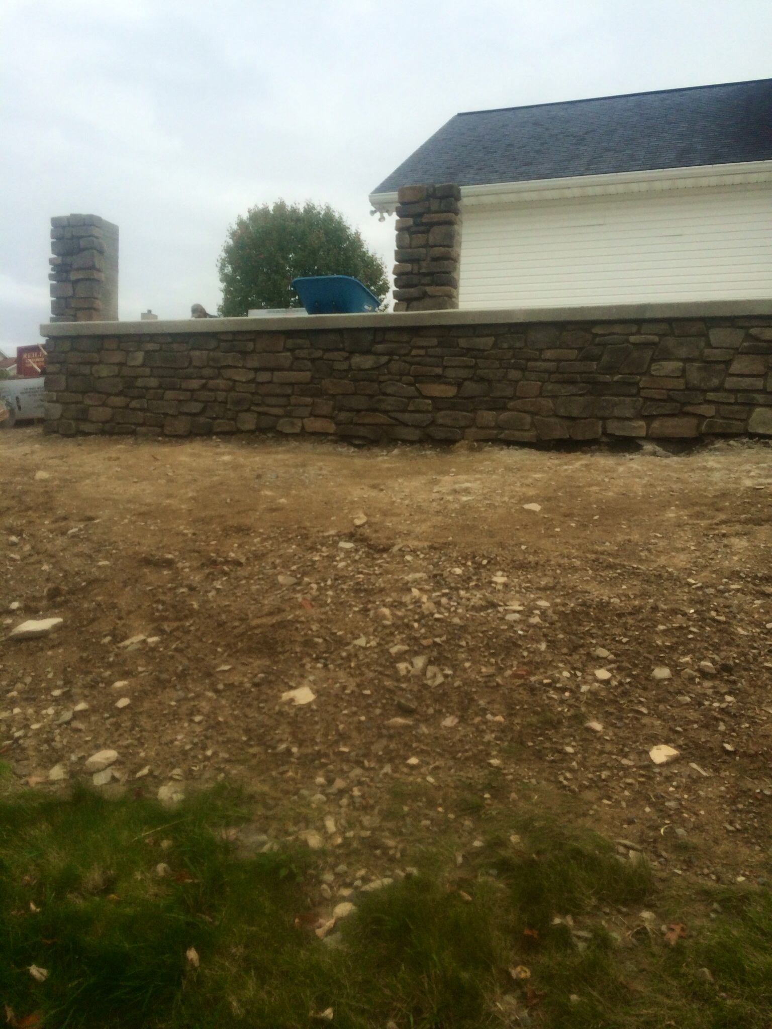 Custom stone fireplace installation demonstrating artisan craftsmanship