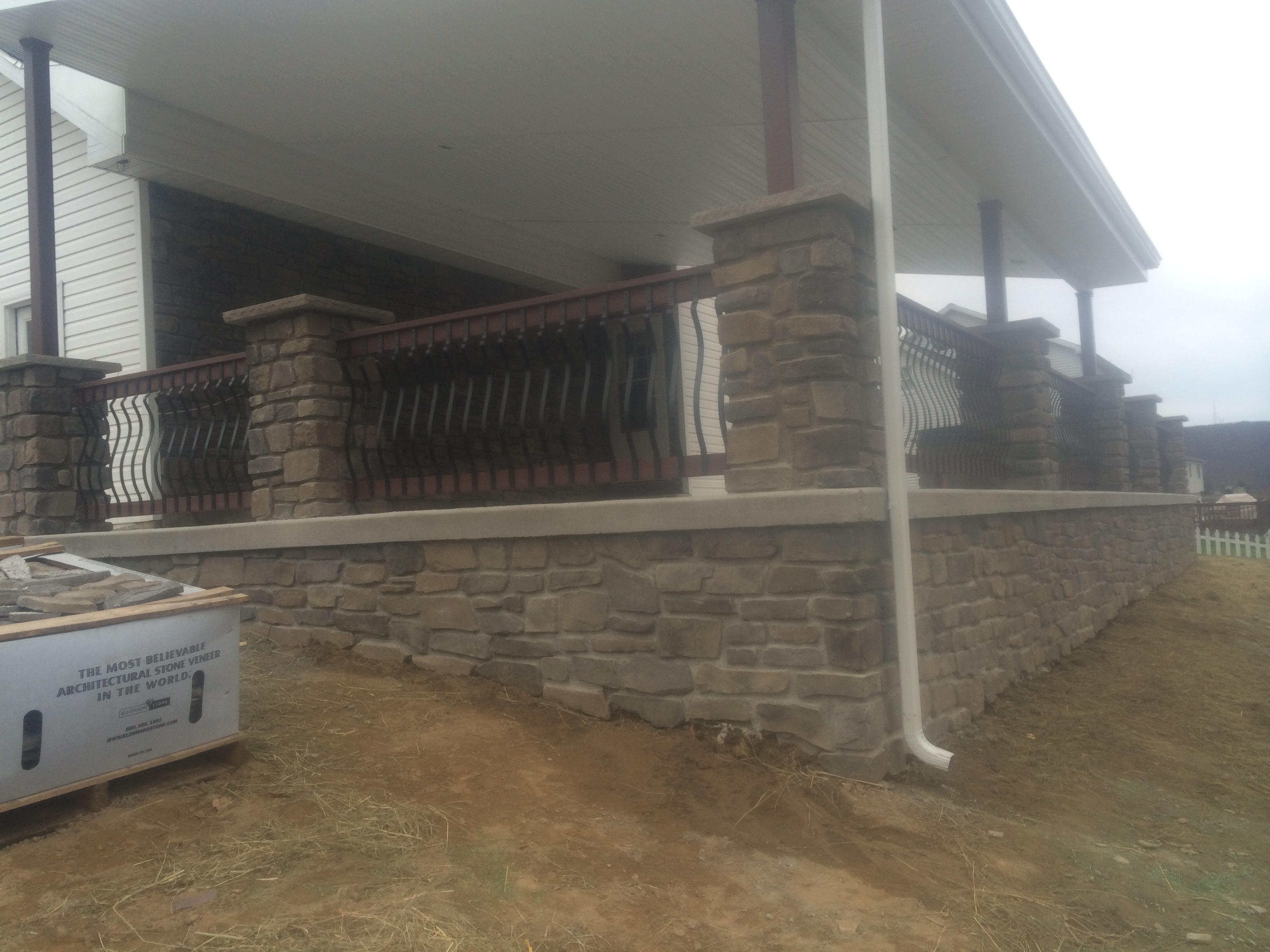 Custom stone entryway with natural fieldstone and mortar detail